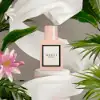 "Gucci Bloom Hair Mist with tuberose, honeysuckle, and vanilla notes."