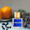 Nishane Perfume – Earthy blend of cypress, sandalwood & cedar.