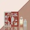 Hermès Un Jardin Sur La Lagune fragrance set with floral, sea, and woody notes.