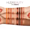 Swatches of Huda Beauty Topaz Obsessions Eyeshadow Palette displaying color pigmentation.