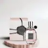 Viktor & Rolf Flowerbomb Eau de Parfum 100mL with a floral and musky scent.