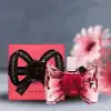 Luxurious Viktor & Rolf Bonbon EDP featuring peach, jasmine, and sandalwood.