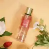 Refreshing Victoria's Secret Temptation Mist with a sweet and fruity aroma.