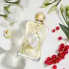 Close-ups of the fruity and floral Meliora Eau of Parfum